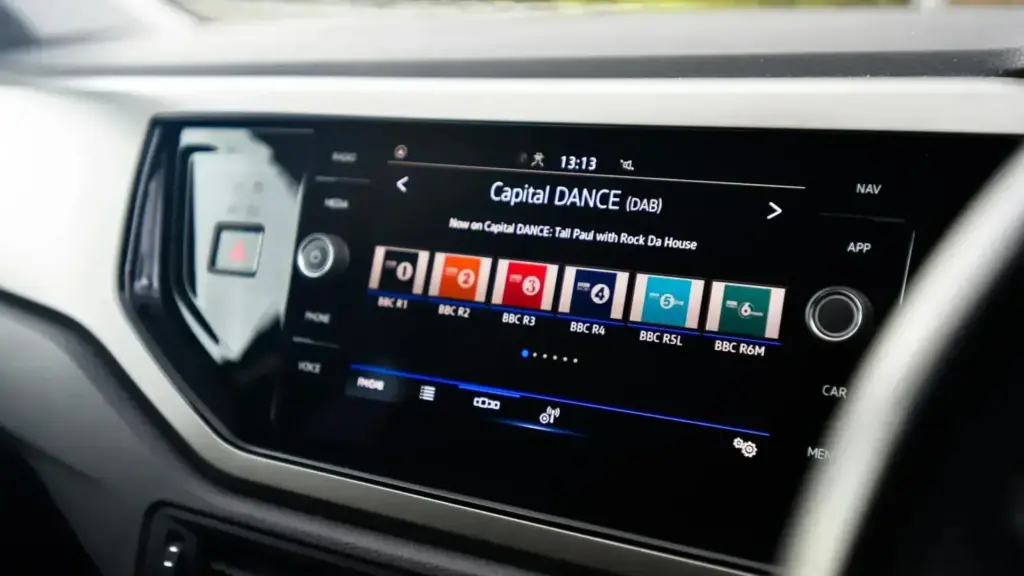 the dashboard of a car with a digital display