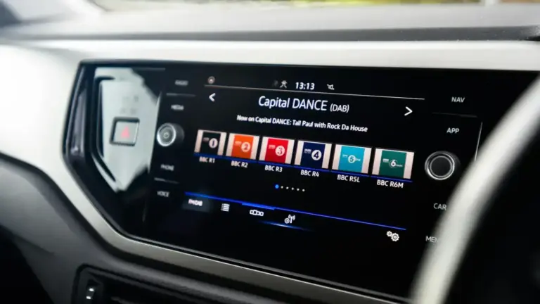 the dashboard of a car with a digital display